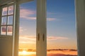 Modern door with window frames with sunrise sky view backgrounds