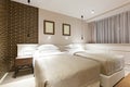 Modern double bed hotel bedroom interior Royalty Free Stock Photo