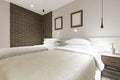 Modern double bed hotel bedroom interior Royalty Free Stock Photo