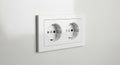 Modern double electrical outlet on wall isolated on white background Royalty Free Stock Photo