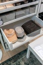Modern drawer in closet with mens accessories inside