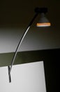 Modern drawing light lamp on top of white drawing board Royalty Free Stock Photo