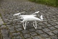 Modern drone quadcopter with digital camera