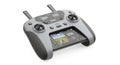 Modern drone remote control with integrated display, isolated on white background Royalty Free Stock Photo