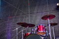 Modern drum set on stage prepared for playing.