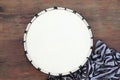 Modern drum on wooden table, top view