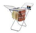 Modern drying rack with clothes on white background