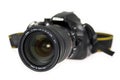 Modern DSLR camera over white Royalty Free Stock Photo