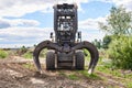 Modern dual function grapple skidder outdoors Royalty Free Stock Photo