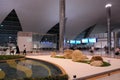 Modern Dubai airport. Modern style interior with shining metal constructions and lots of light.