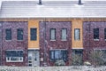 Modern dutch terraced homes during a cold winters day, snowy weather in a small village of the Netherlands Royalty Free Stock Photo