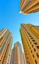 Modern dwelling houses against the blue sky