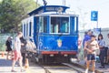 modern eco-friendly electric public transport in Catalonia, old tram for tourists in city centre