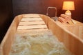 Modern eco-friendly wooden bathroom for hydro massage, relaxation and relaxation Royalty Free Stock Photo