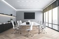 Modern eco style meeting room in skyscraper office with white furniture, big windows and front view on blank black poster on grey Royalty Free Stock Photo