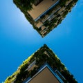 Modern and ecologic skyscrapers with many trees on every balcony Royalty Free Stock Photo