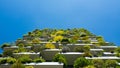 Modern and ecologic skyscrapers with many trees on every balcony Royalty Free Stock Photo