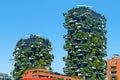 Modern and ecologic skyscrapers with many trees on every balcony Royalty Free Stock Photo