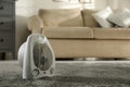 Modern electric fan heater in living room. Space for text Royalty Free Stock Photo