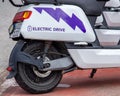 Modern electric motorbike parked on a concrete sidewalk
