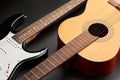 Modern electric and retro acoustic guitars closeup