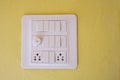 Modern electrical panel isolated on yellow wall