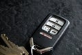 Modern Electronic Smart Key for Car on Dark Background