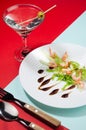 Modern elegant geometric style in food background - lunch of salad with shrimps, greens, celery, teriyaki sauce with martini.
