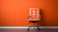 Modern elegant office chair in orange wall