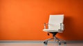 Modern elegant office chair in orange wall