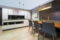 Modern elegant white flat kitchen with island