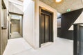 Modern elevator in apartment building hall Royalty Free Stock Photo