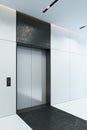 Modern elevator with closed doors in office lobby, 3d render Royalty Free Stock Photo