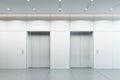 Modern elevator with closed doors in office lobby Royalty Free Stock Photo