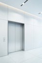 Modern elevator with closed doors in office lobby, 3d Royalty Free Stock Photo