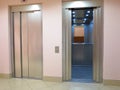 Modern elevator with opened and closed doors Royalty Free Stock Photo