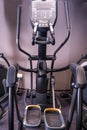 Modern black ellipsoid trainer in dark gym