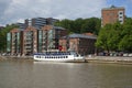 The modern embankment of the river Aura on a summer day. Turku, Finland