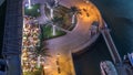 Modern embankment timelapse with bar, Cafe and Restaurant in famous Dubai Marina. Royalty Free Stock Photo