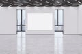 Modern empty concrete exhibition hall interior with blank white poster, windows and city view, many doors and mock up place on Royalty Free Stock Photo