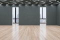 Modern empty concrete exhibition hall interior with wooden flooring, windows and city view, many doors and mock up place on walls Royalty Free Stock Photo