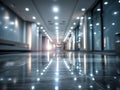 Modern empty corridor with reflective floor and bright ceiling lights Royalty Free Stock Photo