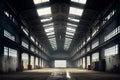 Modern empty dark storehouse with light at the end Royalty Free Stock Photo