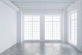 Modern empty loft room with big windows and concrete floor Royalty Free Stock Photo