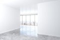 Modern empty loft room with big windows, white wall and concrete