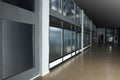 Modern empty office corridor with glass wall Royalty Free Stock Photo