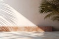 Modern empty pastel brown concrete counter table top in sunlight, palm leaf shadow on stucco texture wall. 3d rendering. Royalty Free Stock Photo