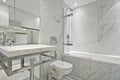 Modern en suite marble bathroom in white Royalty Free Stock Photo