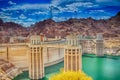 Modern Energetics Ideas. Hoover Dam With Penstock Towers in Lake Mead of the Colorado River on Border of Arizona and Nevada Royalty Free Stock Photo