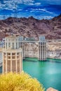 Modern Energetics Ideas. Hoover Dam With Penstock Towers in Lake Mead of the Colorado River on Border of Arizona and Nevada States Royalty Free Stock Photo